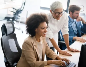 Three employee enjoying digital tool at work